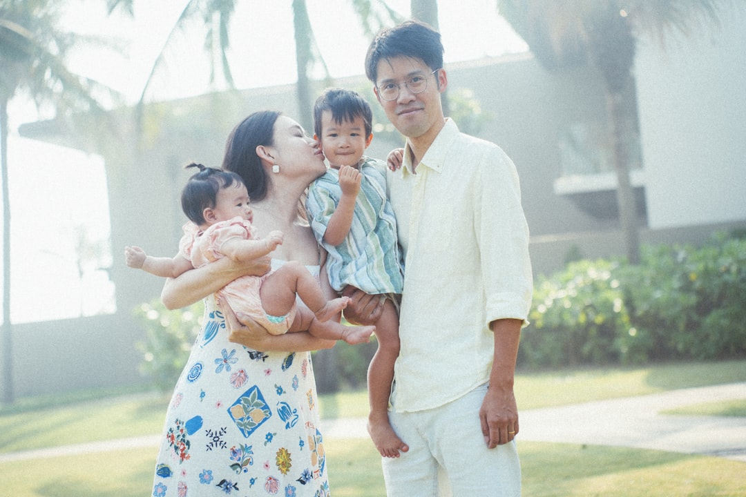 Happy Thai family protected by insurance
